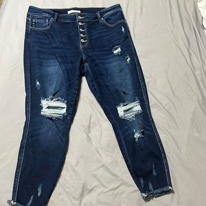 Dark washed ripped jeans